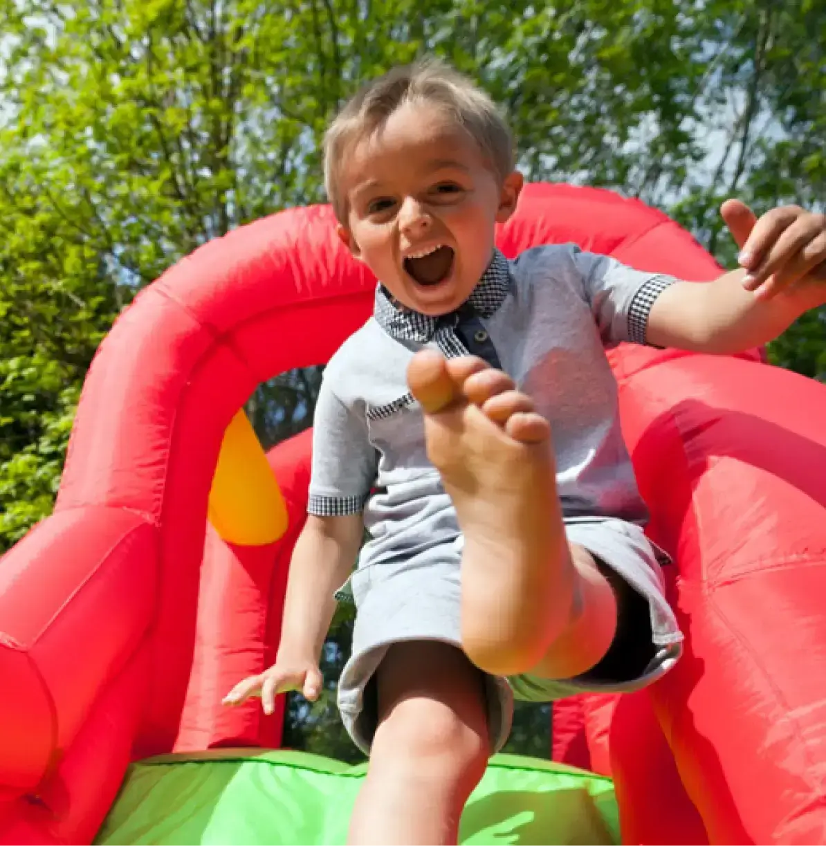 Children playing on bounce house